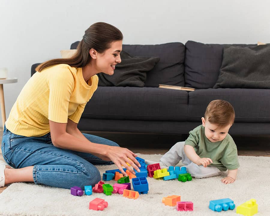 Mother playing with her child in the lounge